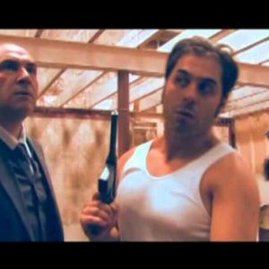 Screenshot of Bobey Taleb in Australian Enemy playing the role of Mario Castino.