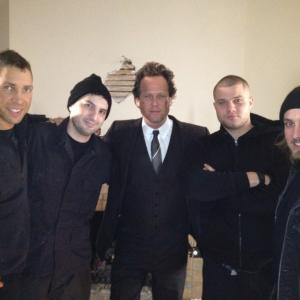 on set with the cast from an ALLSTATE commercial. In the middle is Dean Winters(OZ, 30 Rock, etc) aka 'Mayhem'