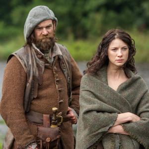 Still of Caitriona Balfe and Duncan Lacroix in Outlander 2014