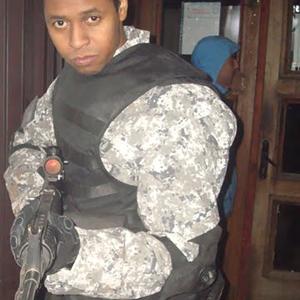 Owen Davis as Apartment Soldier on the set of Spiders 3D 2010