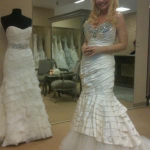 The Brides of Beverly Hills Reality Show Eileen stars as one of the Brides posing in one of Renee Strauss dresses
