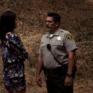 Thomas Haley as Sheriff Sullivan and Ms Mariana Novak as Lainey in The Neighbourhood a Miniseries Directed by Koltin Sullivan a FLIPLINK Production