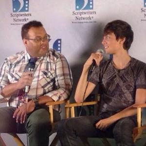 CJ and The Stream writer, Colin Costello, are interviewed at a panel for the Scriptwriters Network