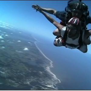 Reporter Tayfun King, Skydiving, Punta del Este, Uruguay, BBC World News television travel show 