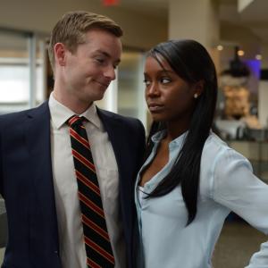Still of Christopher Masterson and Aja Naomi King in Onion News Empire 2013