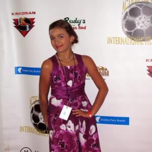 Madeline on the Red Carpet at Action On Film 2013 Awards She was nominated for WAB Best Performance  Male or Female for her role as Juliecula