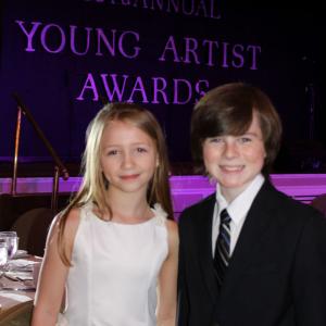 Chandler Riggs and Emma Rayne Lyle pose at the 33rd Young Artist Awards