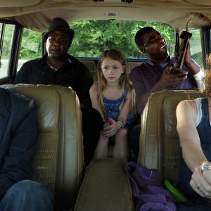 Still of Jesse Eisenberg Melissa Leo Tracy Morgan Isiah Whitlock Jr and Emma Rayne Lyle in Why Stop Now? 2012