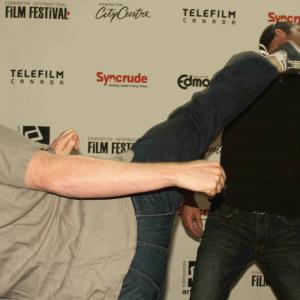 Jeff Burkes iron chin is breaking the foot of Ryan Burke at the Edmonton International Film Festival