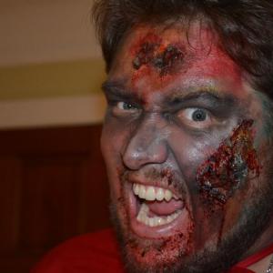 Derek Easley as Zombie Geek