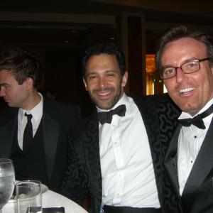 Three writers waiting for the awards to be given at the Beverly Hills Film Festival.