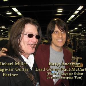 J Michael Miller with Rusty Anderson Lead Guitar Player with Paul McCartney player of Voyageair Guitar