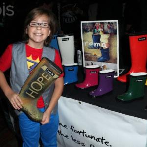 Gabe with Roma Boots for Wounded Warrior Project