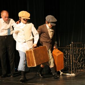 Tryston Skye in The Remarkable Mr Pennypacker on stage with Don Jorgensen and Isaac Cervantes