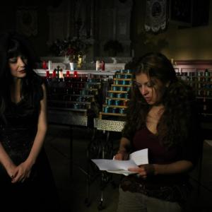 Kelly getting direction from Director Patricia Chica for the church scene from the Tangled Forest video