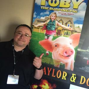Gabriel Campisi with Toby poster at AFM in Santa Monica