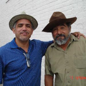 Pedro Garcia director and Rigoberto Ordaz take photo during a break in presentation of 