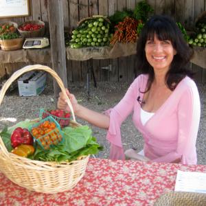 Awardwinning on camera personality and host of RomancingTheTablecom on location in California for Cynthia Daddona Explores Fairview Gardens CSA Community Shared Agriculture Program