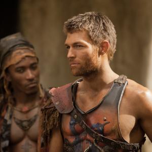 Still of Liam McIntyre and Blessing Mokgohloa in Spartacus: Blood and Sand (2010)