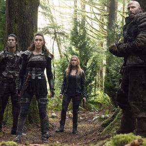 Still of Eliza Taylor Graham Shiels Alycia DebnamCarey and Arleo Dordar in The 100 2014