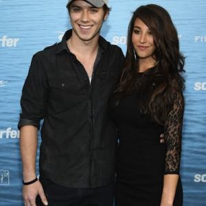 Jeremy Sumpter and Genevieve Helm attending the Soul Surfer premiere in Los Angeles CA