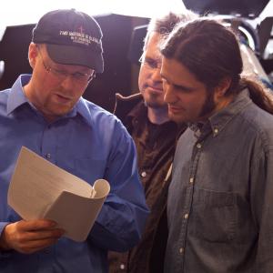 ProducerDirector Christopher Shawn Shaw looking over the SKIP LISTENING script with Actors Thor Ramsey and Josh B Jacobs