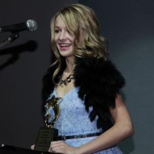 Erin Pitt accepting the Young Artist Award from Anchor Bay for her role as Hanna Wade in Against the Wild