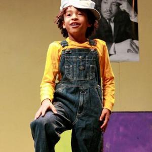 Jaden Betts playing Joe singing Conjuction Junction in Act1s theater production of School House Rock