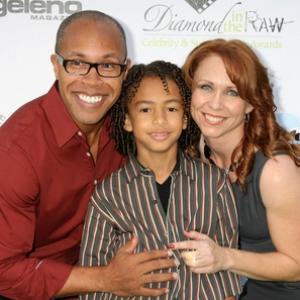 Jaden with mom Melissa Barker and dad Erik Betts at the 2011 Diamond in the Raw Stuntwomen Awards where mom won the Stuntwoman of the Year award