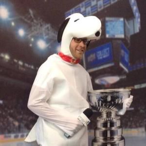 Matt Schichter dressed as Snoopy posing with the Stanley Cup for MSN Exclusives coverage of Fan Expo 2013
