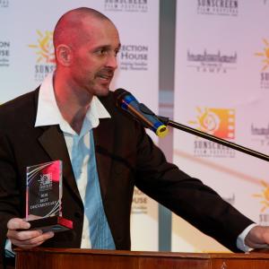 Accepting the award for BEST DOCUMENTARY at the Sunscreen Film Festival