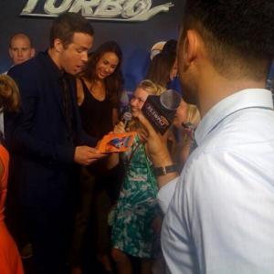 Cailin Loesch left and sister Hannah Loesch with Ryan Reynolds at the NYC premiere of Turbo
