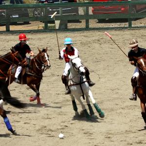 Mikayla front and center on the white horse OC Horse Polo Tournament