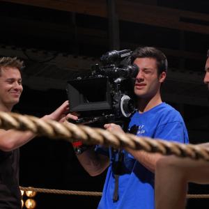 Cinematographer Will Carnahan and AD Robert Statwick beside Bryce Hirschberg on the set of BAER