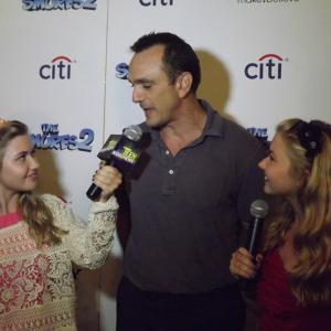 Cailin Loesch (right) and sister Hannah Loesch with Hank Azaria at the NYC premiere of Smurfs 2