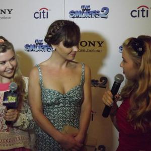 Cailin Loesch right and sister Hannah Loesch with Christina Ricci at the NYC premiere of Smurfs 2
