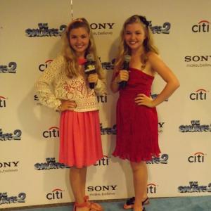 Cailin Loesch right and sister Hannah Loesch at the NYC premiere of Smurfs 2