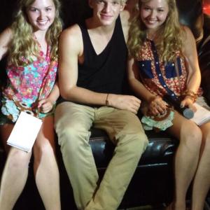 Cailin Loesch right and sister Hannah Loesch with Cody Simpson