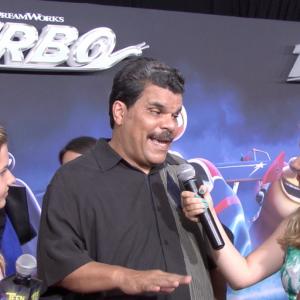 Cailin Loesch right and sister Hannah Loesch with Luis Guzman at the NYC premiere of Turbo
