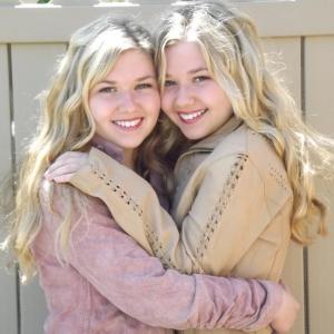Cailin Loesch right and twin sister Hannah Loesch in 2013