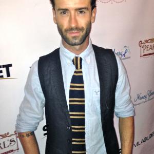 David Scharschmidt on the red carpet at Pearls Oscar party in West Hollywood