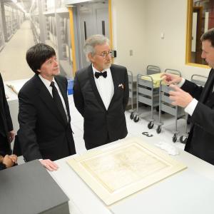 Foundation for the National Archives Chair and President ALelia Bundles Archivist of the United States The Honorable David S Ferriero Foundation for the National Archives Board Vice President and Gala Chair Ken Burns filmmaker and honoree Steven Spielberg and archivist Trevor Plante view the 13th Amendment to the Constitution at the Foundation for the National Archives 2013 Records of Achievement award ceremony and gala in honor of Steven Spielberg on November 19 2013 in Washington DC
