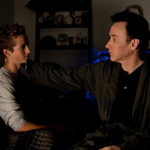 John Cusack and Evan Bird in Maps to the Stars 2014