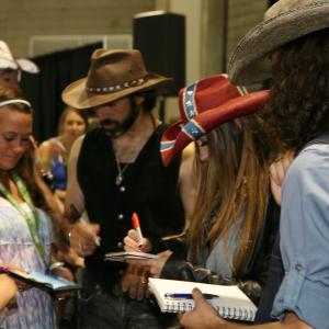 Angel Mary & the Tennessee Werewolves signing autographs at Fan Fair CMA FEST