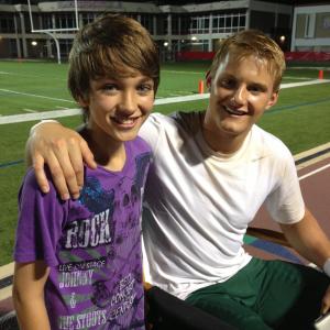 Gavin Casalegno and Alexander Ludwig on the set of When the Game Stands Tall