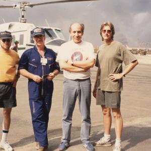 Before taking off to shoot the blazing oil wells of Kuwaits Burgan Field  Farouq surrounded by Barakas DP  Director Ron Fricke super pilot Greg Nutt and Mark Magidson in 1991
