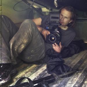 Director producer writer and sometimes cinematographer William Norton sets up a shot from within a militarized Humvee for his political thriller False Colors