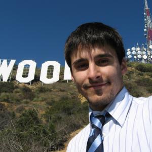 Josh Wood on the MtLee taking photo of Hollywood sign Hollywood Hills Los Angeles California