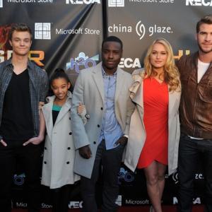 Amandla Stenberg with Jack Quaid Dayo Okeniyi Leven Rambin and Liam Hemsworth at The Hunger Games National Mall Tour event in Atlanta  March 6 2012