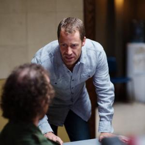 Sinister Man (Kyle Mitchell) getting interrogated by William (Colin Ferguson) and Audrey Parker (Emily Rose) at Haven PD. Haven TV Show - 2013. Episode 409.